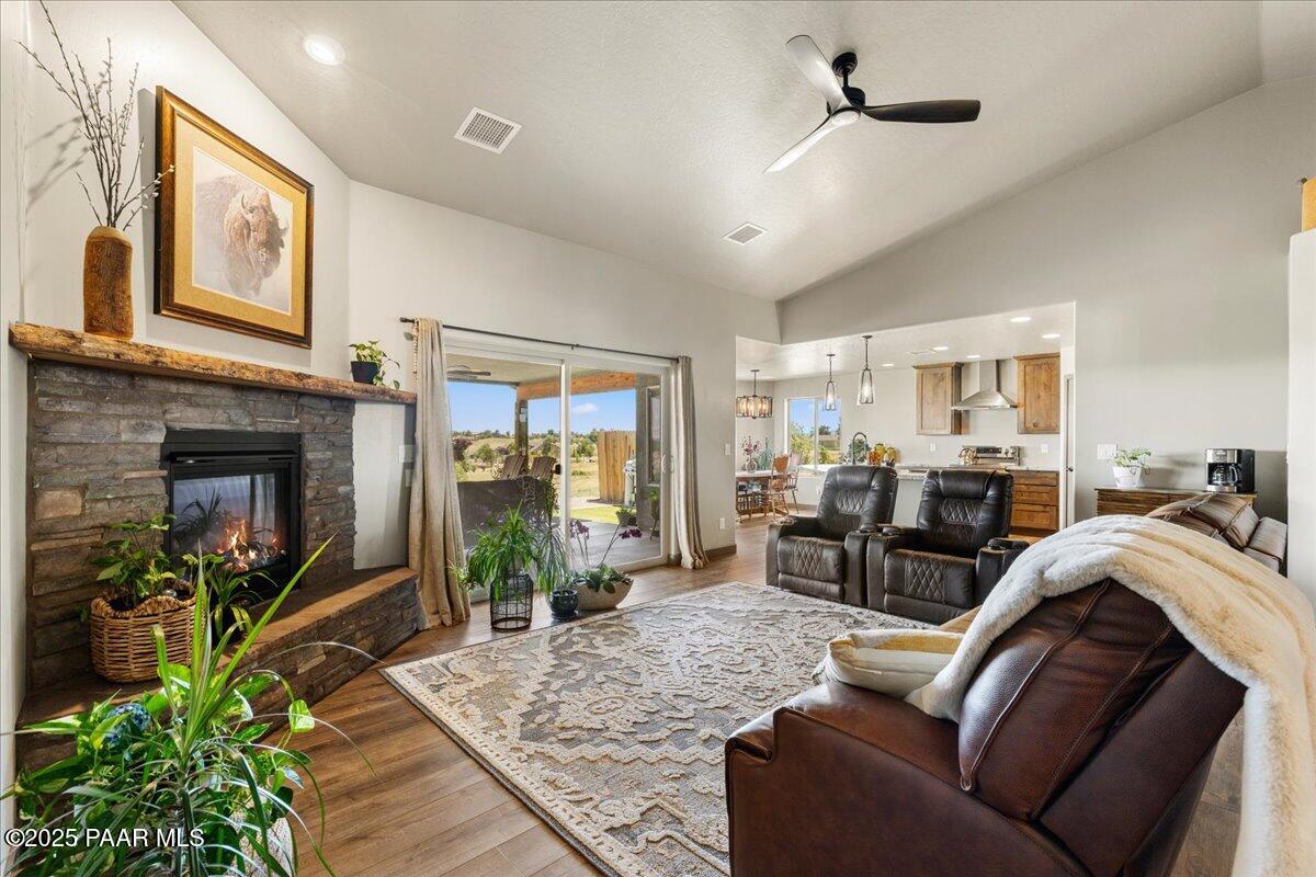 1617 Windmill Way Chino Valley, AZ 86323 - Photo 7 of 42 a living room with furniture and a fireplace