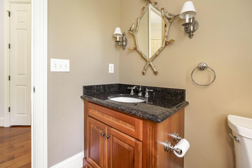 8382 Deep Run Powell, OH 43065 - Photo 13 of 92 First Floor Half Bathroom 1