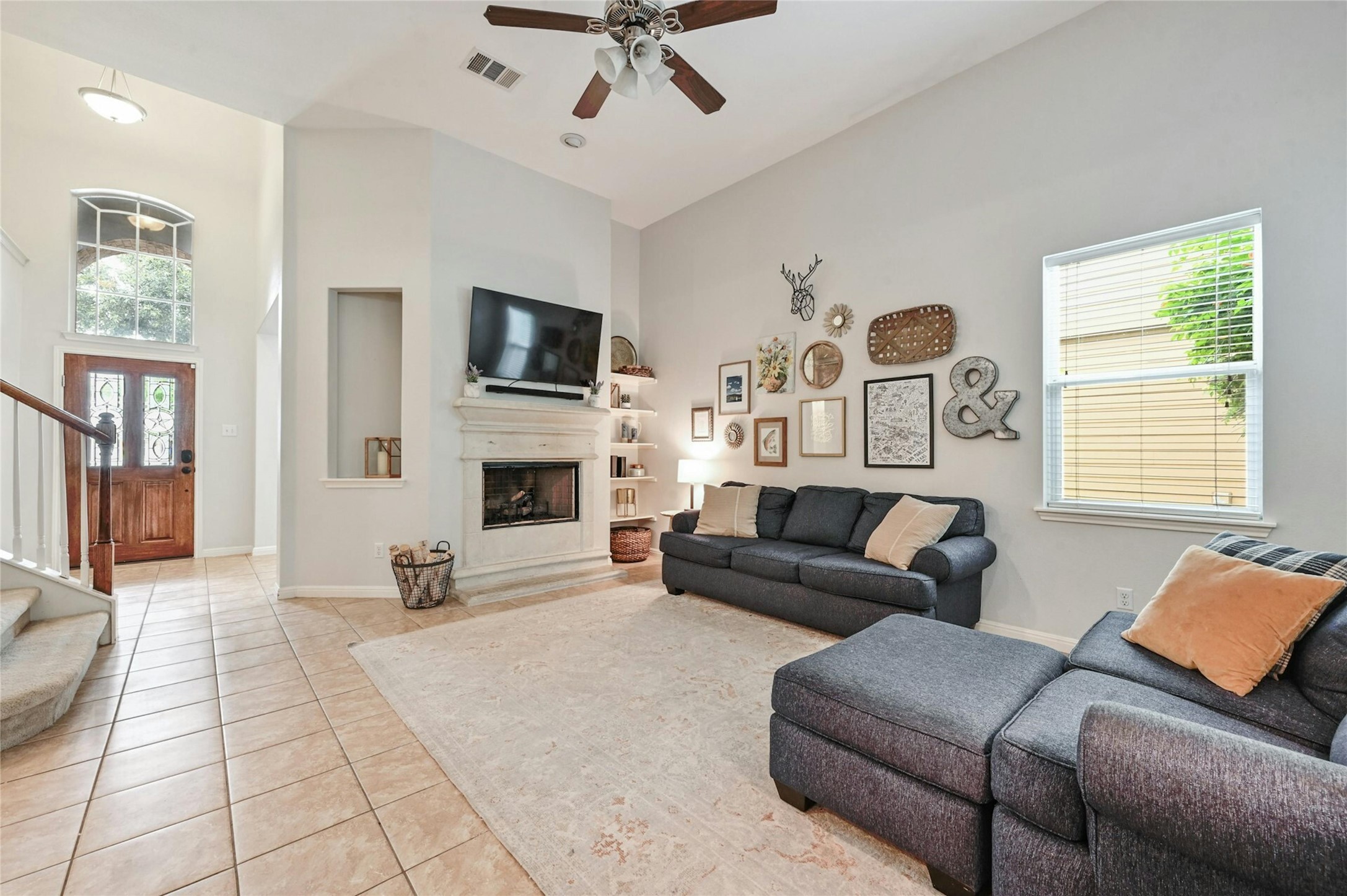 130 Farm House Road San Marcos, TX 78666 - Photo 3 of 34 a living room with furniture and a flat screen tv
