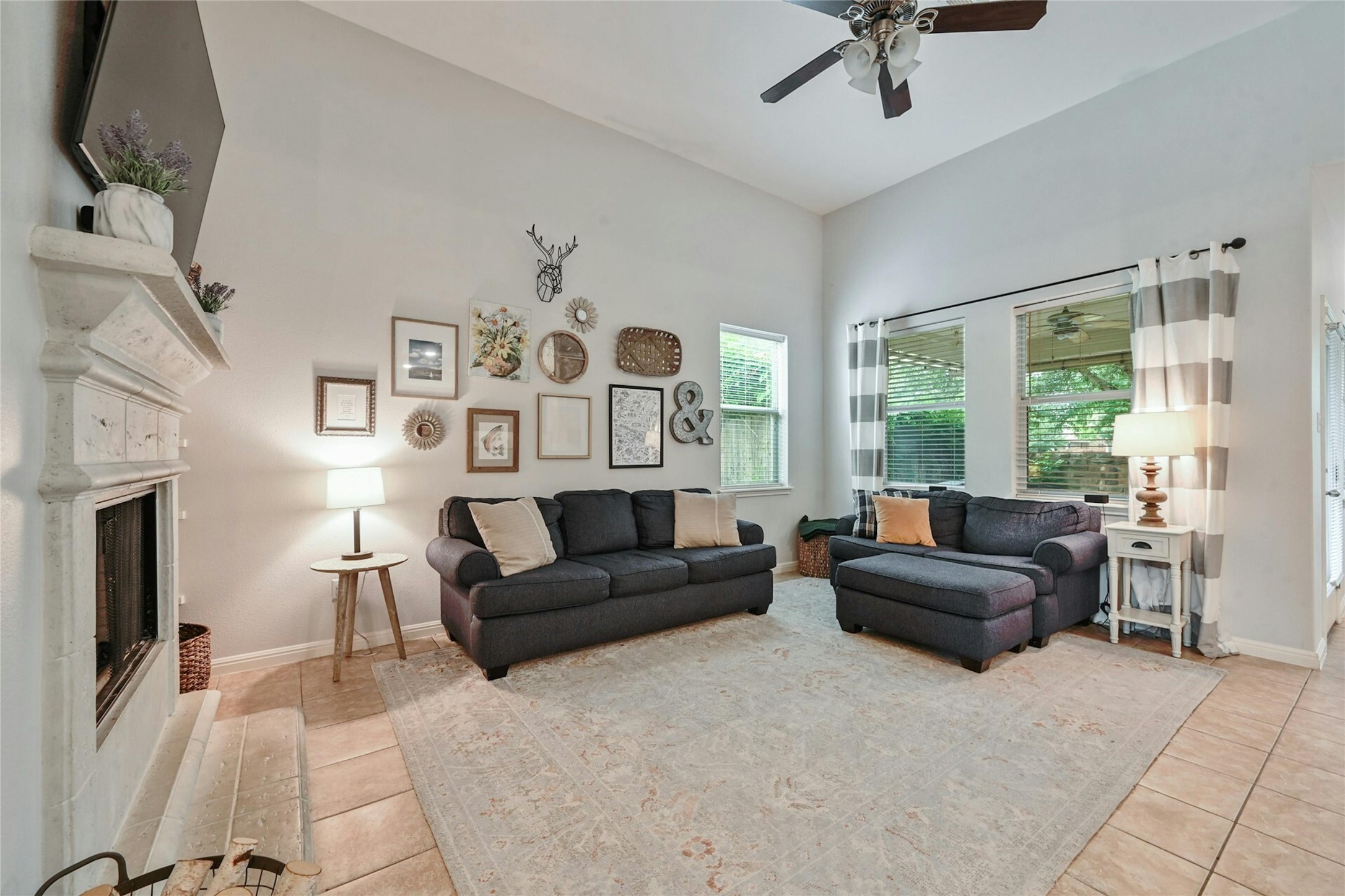 130 Farm House Road San Marcos, TX 78666 - Photo 4 of 34 a living room with furniture and a large window