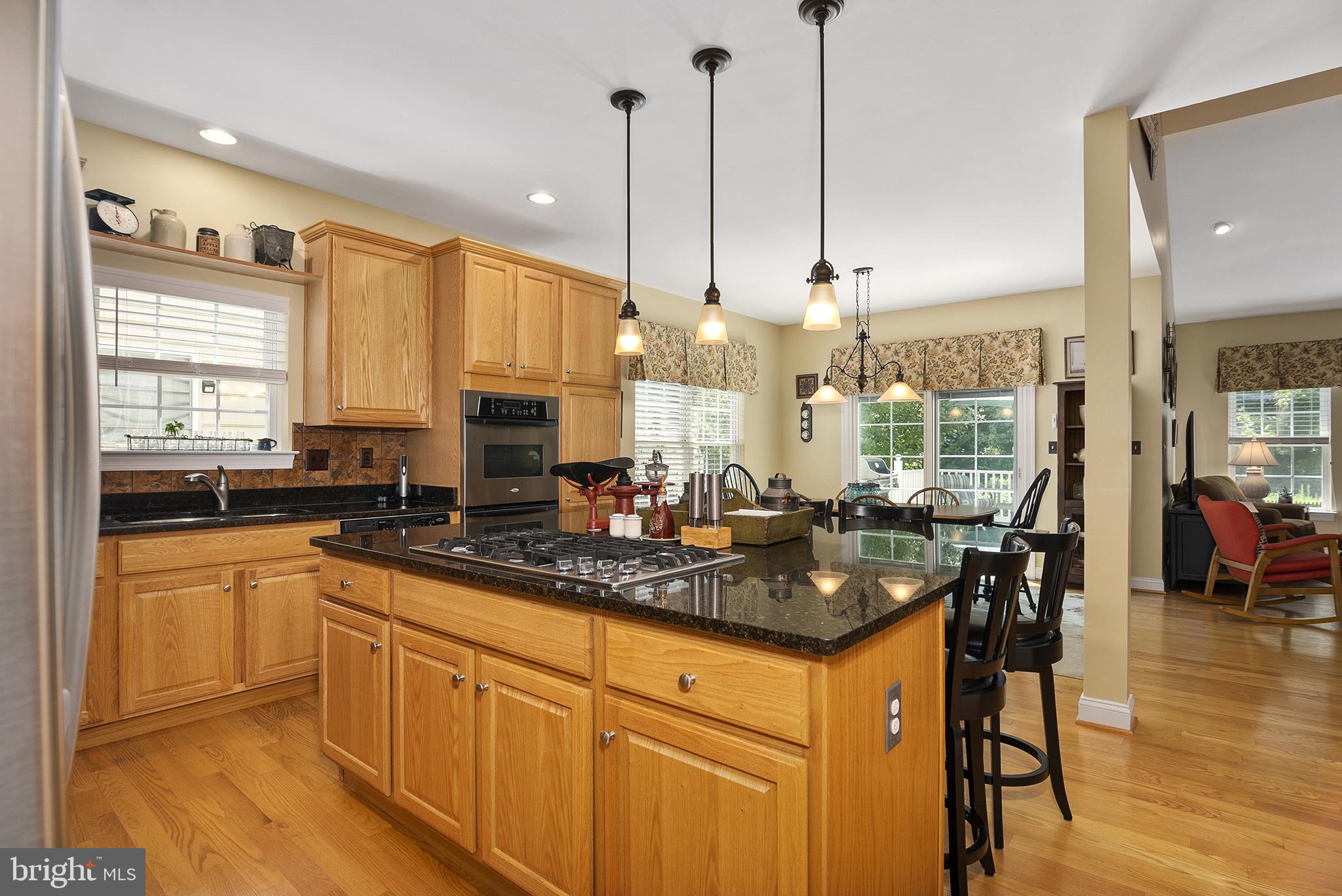 73 Devalinder Drive Newark, DE 19702 - Photo 7 of 28 Kitchen Open to Great Room, Eating Area & Deck