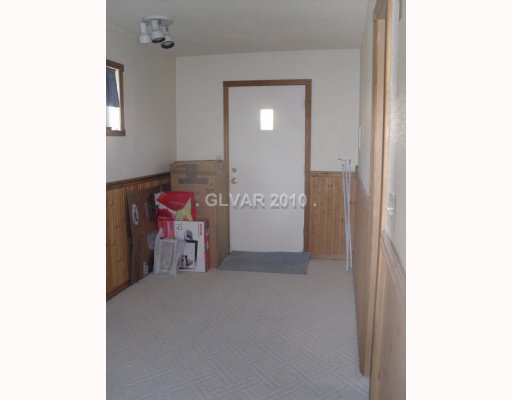 6591 Vigo Road Las Vegas, NV 89146 - Photo 13 of 17 Other. Storage room in casita with door to backyard and rv garage.
