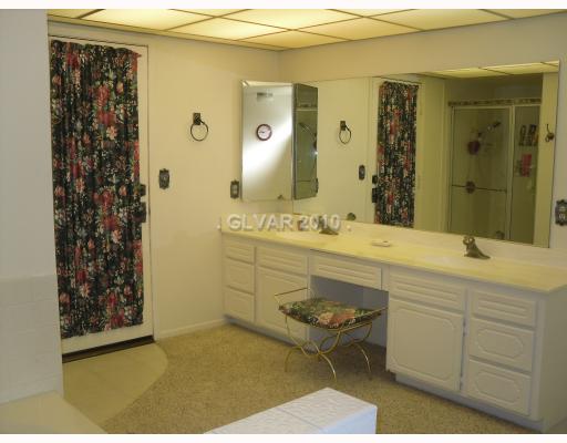6591 Vigo Road Las Vegas, NV 89146 - Photo 8 of 17 Master Bath/Spa. Open master bath with a door to private spa.