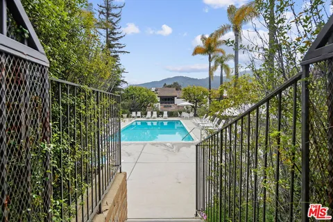 a view of a balcony with an outdoor space