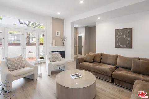 a living room with furniture and a couch