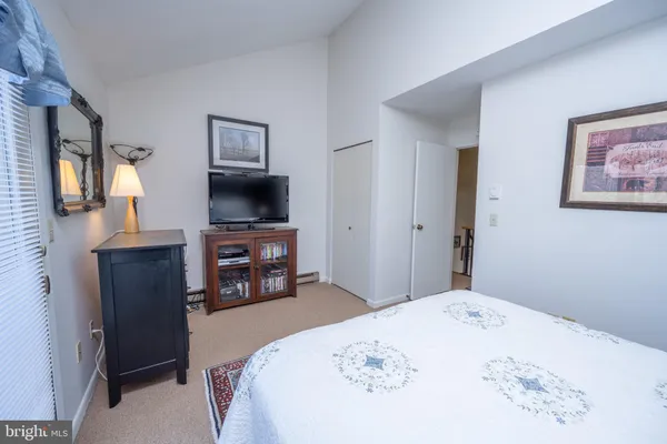 a view of a hallway with a livingroom