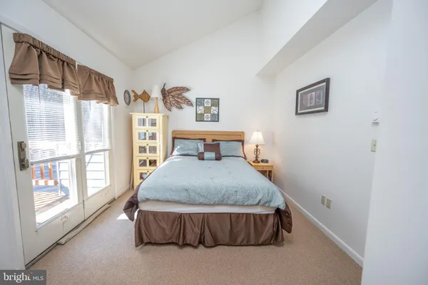 a view of a balcony with yard