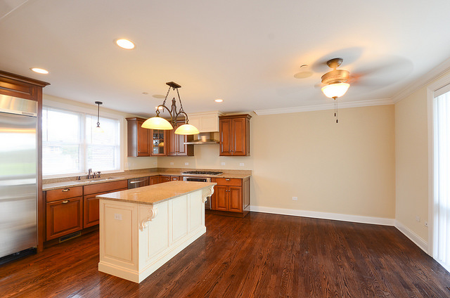 245 North Northwest Highway Park Ridge, IL 60068 - Photo 2 of 15 a kitchen with a stove a sink and a refrigerator
