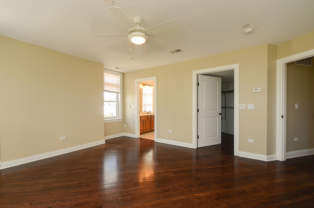 245 North Northwest Highway Park Ridge, IL 60068 - Photo 9 of 15 a view of an empty room with wooden floor and a window