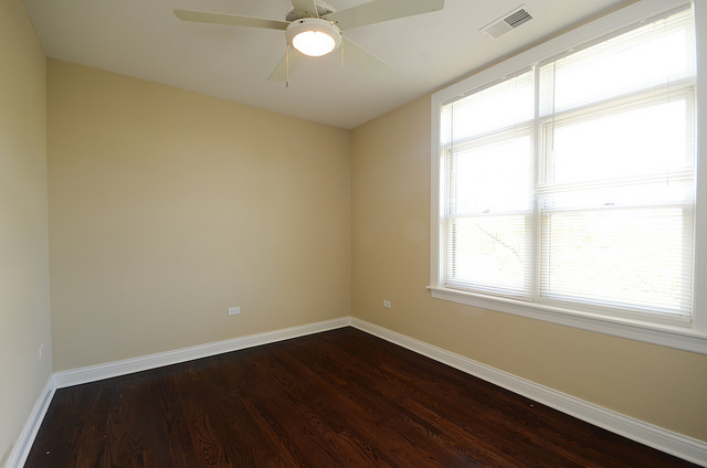 245 North Northwest Highway Park Ridge, IL 60068 - Photo 10 of 15 an empty room with wooden floor and windows