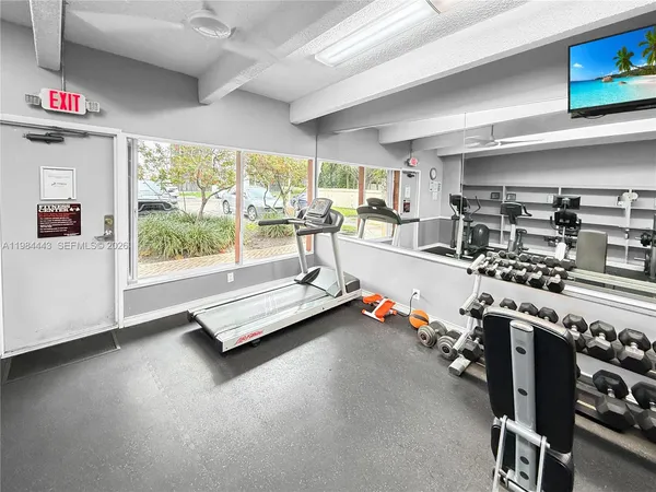 a view of a room with gym equipment