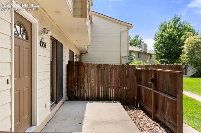 a view of a wooden fence