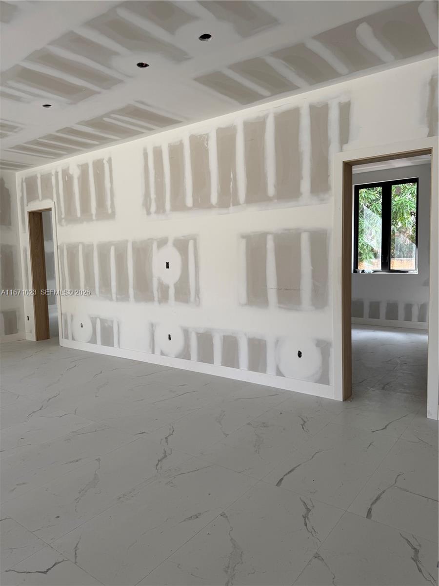 6666 Southwest 96th Street Pinecrest, FL 33156 - Photo 17 of 82 a view of an empty room with a balcony