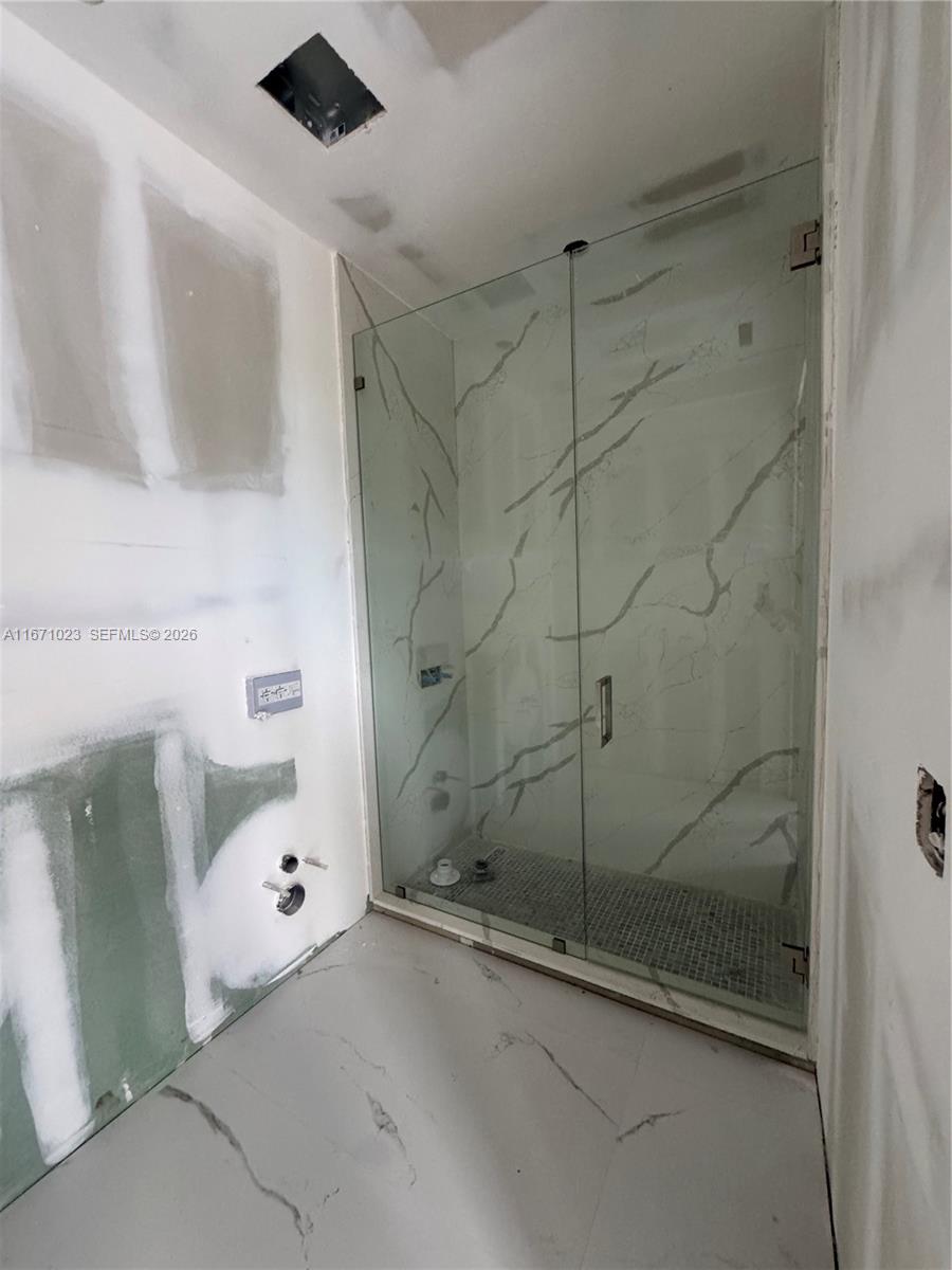 6666 Southwest 96th Street Pinecrest, FL 33156 - Photo 25 of 82 a bathroom with a shower