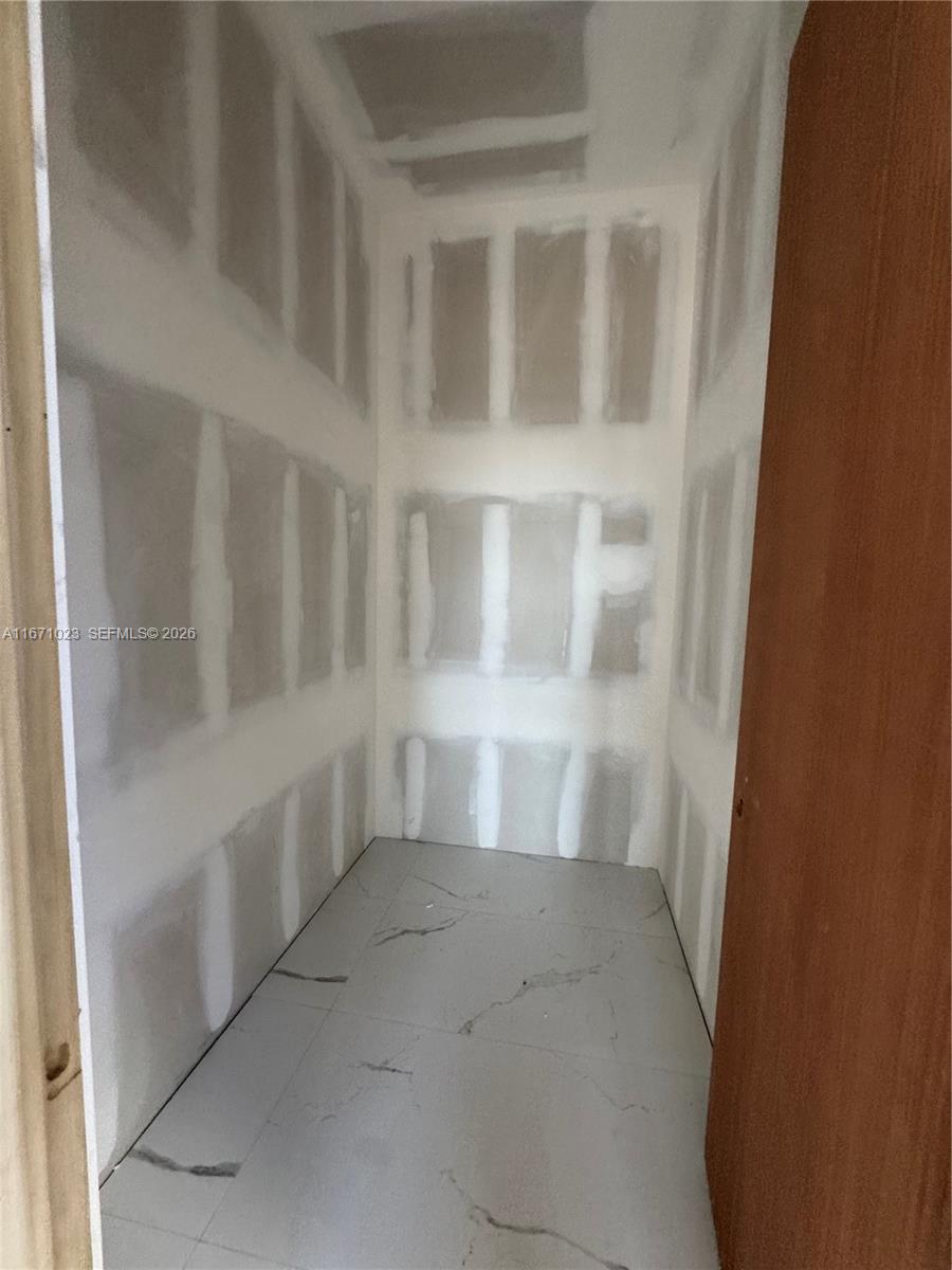 6666 Southwest 96th Street Pinecrest, FL 33156 - Photo 49 of 82 a view of an empty room