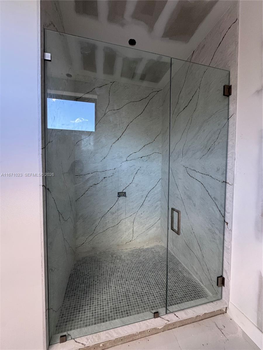 6666 Southwest 96th Street Pinecrest, FL 33156 - Photo 51 of 82 a bathroom with a shower