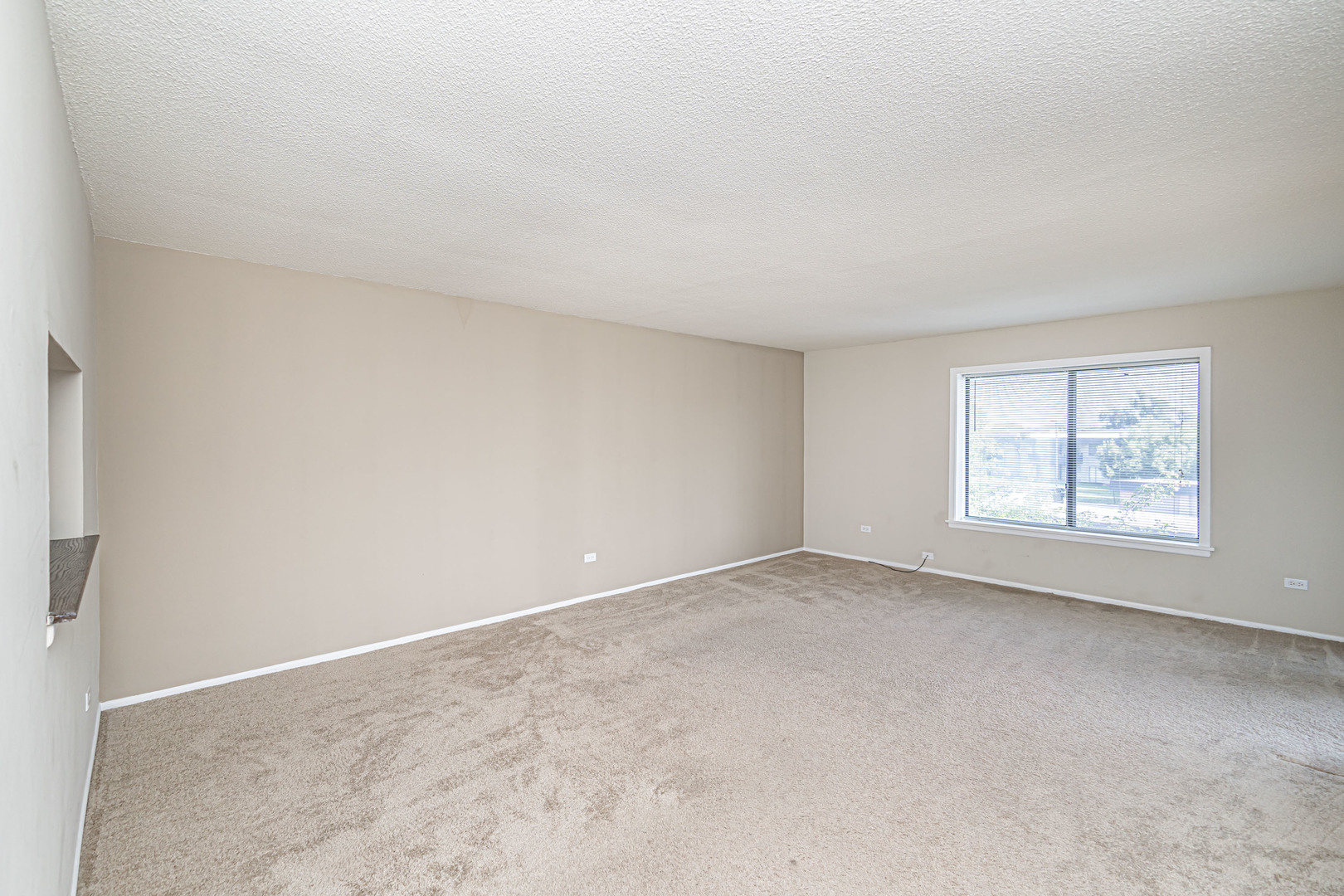 1255 North Sterling Avenue, Unit 201 Palatine, IL 60067 - Photo 14 of 22 an empty room with windows