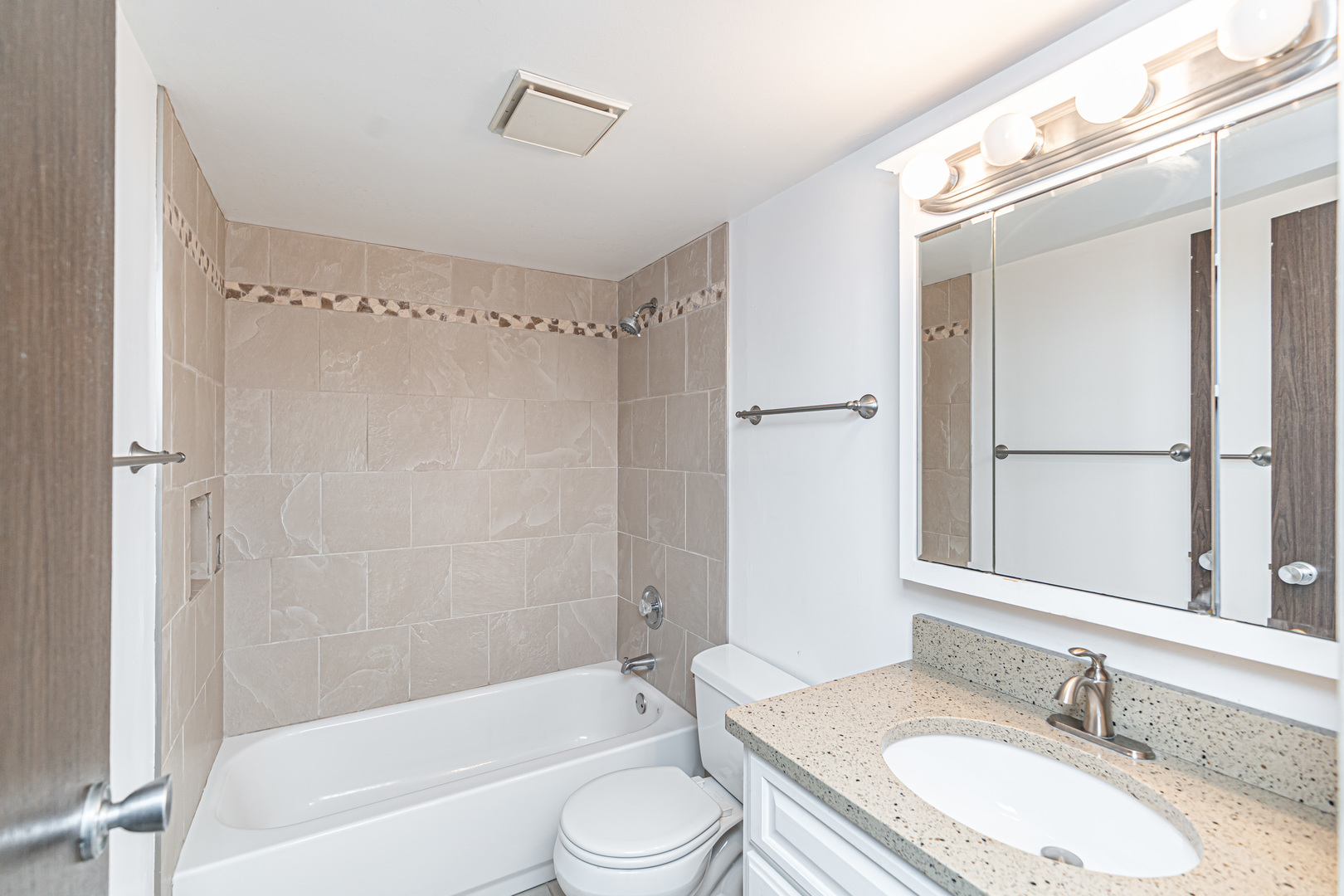1255 North Sterling Avenue, Unit 201 Palatine, IL 60067 - Photo 17 of 22 a bathroom with a granite countertop sink toilet and shower