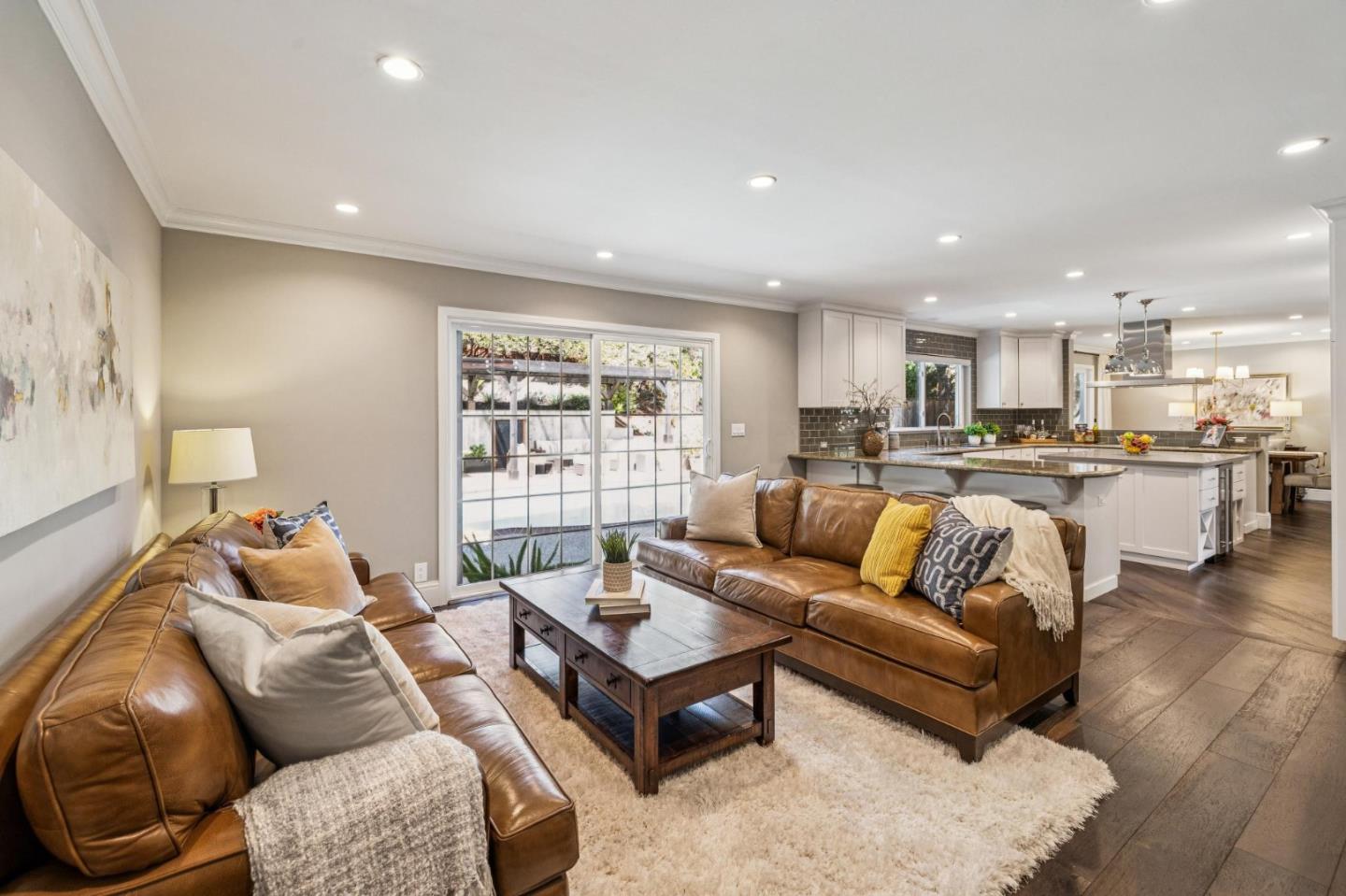 21685 Regnart Road Cupertino, CA 95014 - Photo 22 of 68 a living room with furniture and a large window