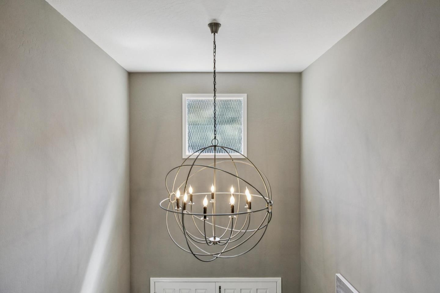 21685 Regnart Road Cupertino, CA 95014 - Photo 26 of 68 a room with a decorative lights