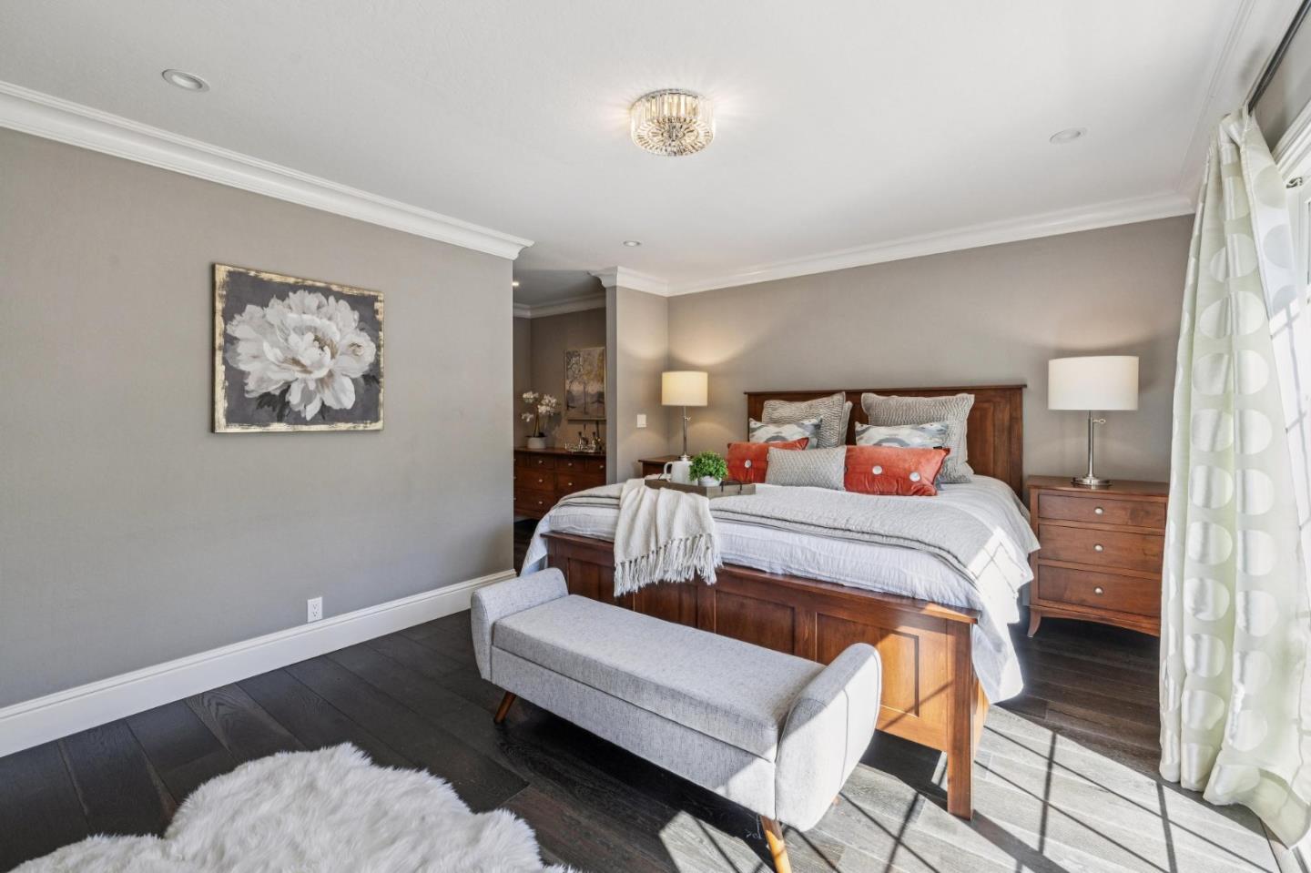 21685 Regnart Road Cupertino, CA 95014 - Photo 28 of 68 a bedroom with a bed and wooden floor