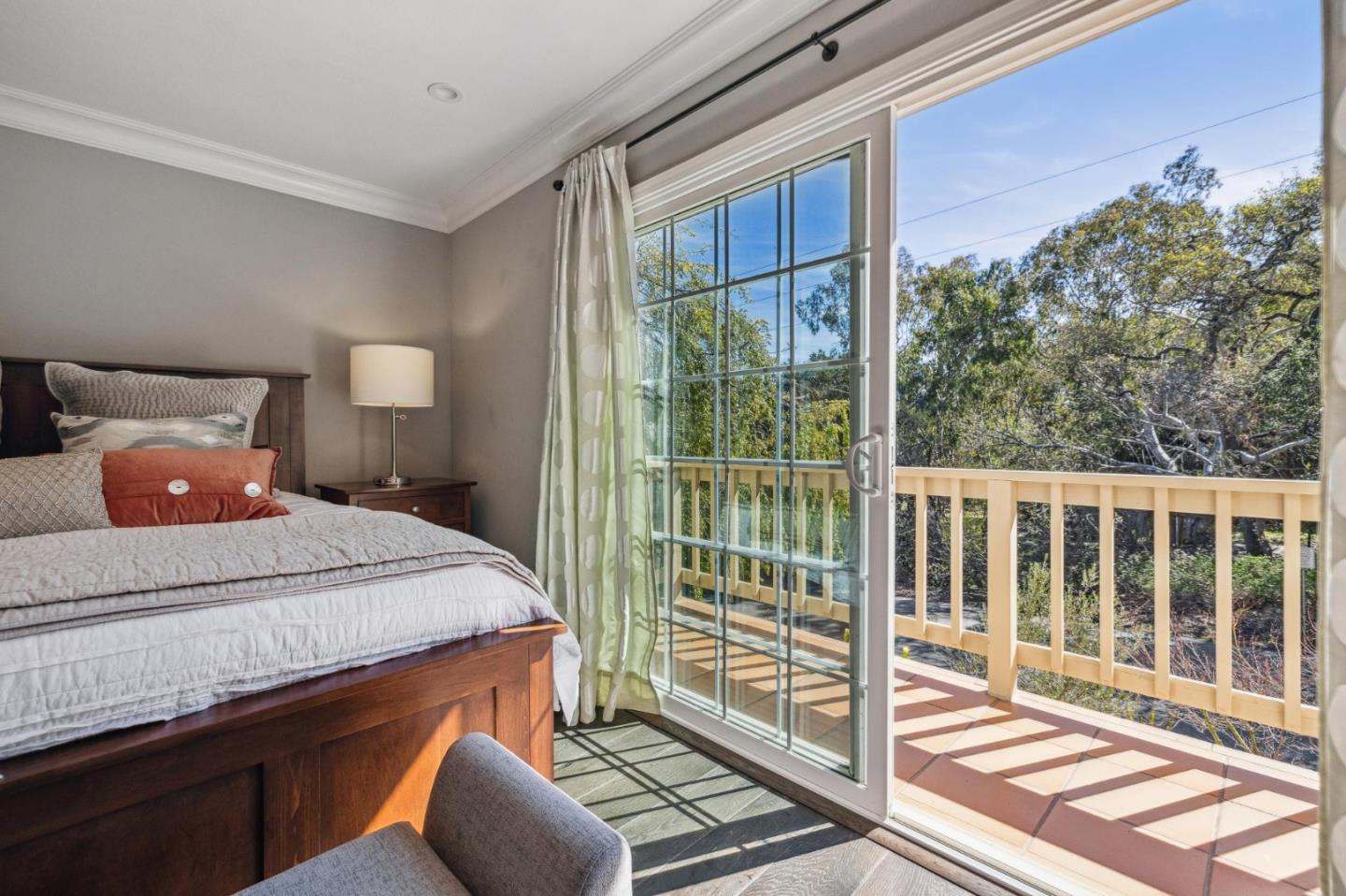 21685 Regnart Road Cupertino, CA 95014 - Photo 30 of 68 a bedroom with a bed and a window