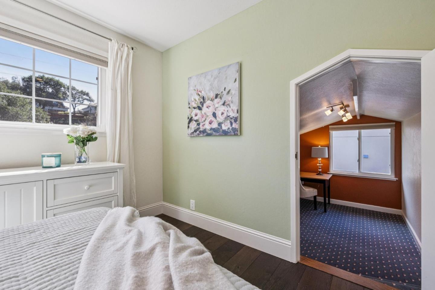 21685 Regnart Road Cupertino, CA 95014 - Photo 46 of 68 a bedroom with a bed and a window