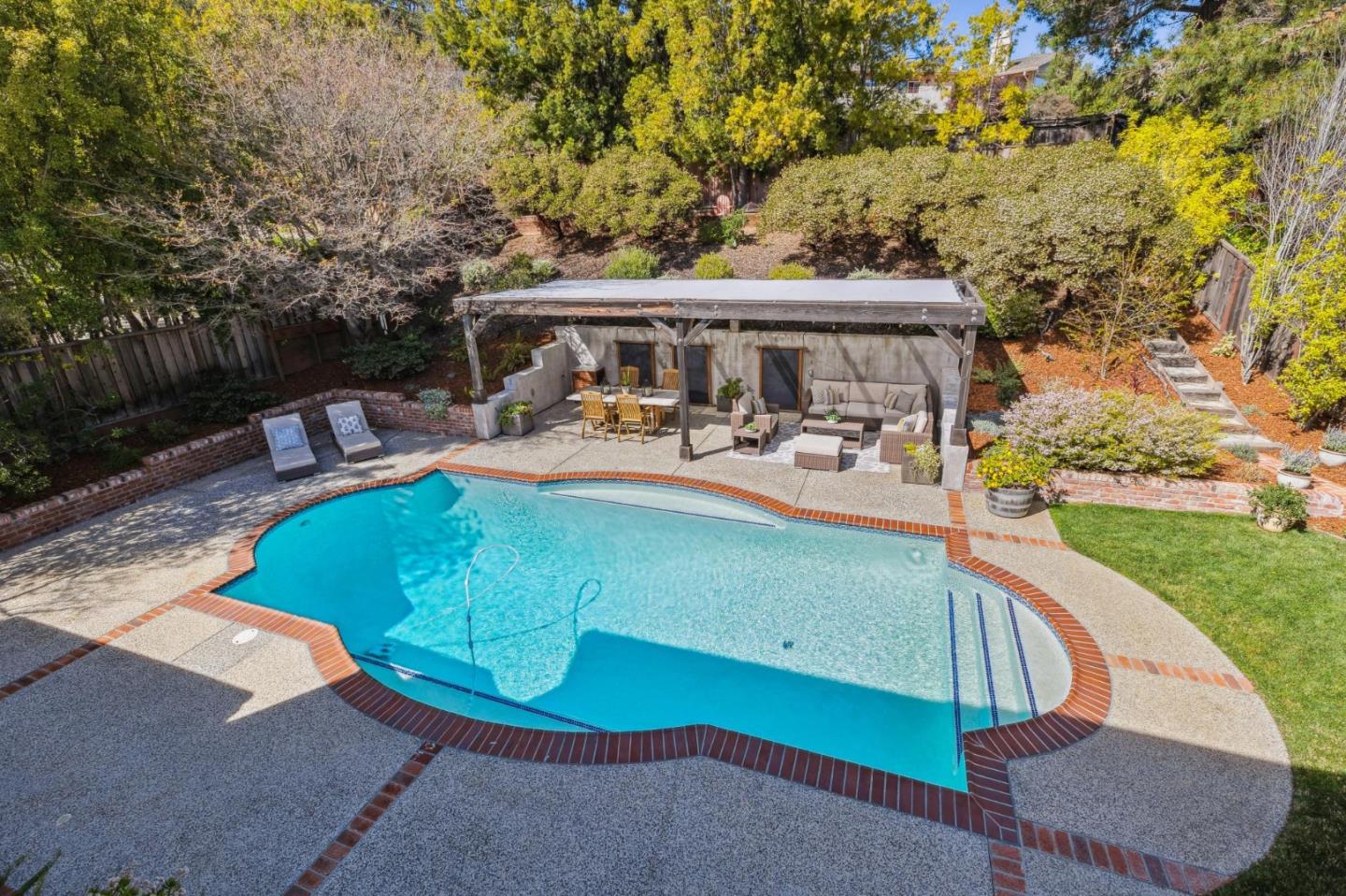 21685 Regnart Road Cupertino, CA 95014 - Photo 48 of 68 an outdoor view of the patio and swimming pool