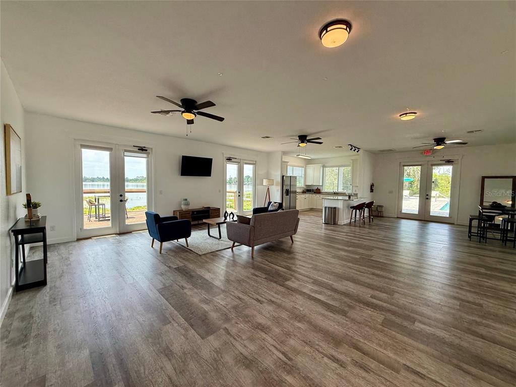 2541 Pine Place Winter Haven, FL 33881 - Photo 29 of 34 a living room with furniture and a wooden floor