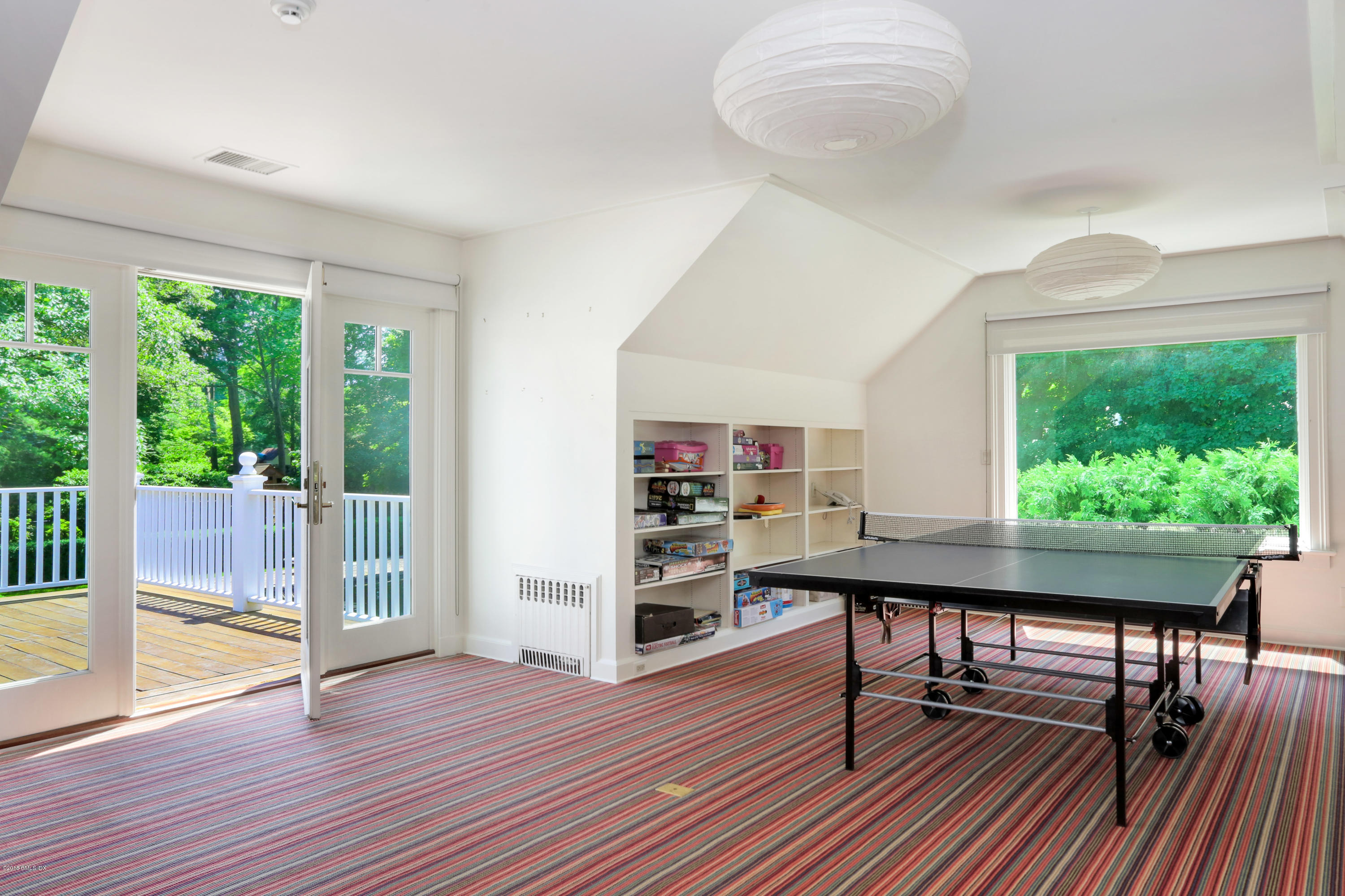 70 Midwood Road Greenwich, CT 06830 - Photo 19 of 26 a view of a workspace with furniture and a window