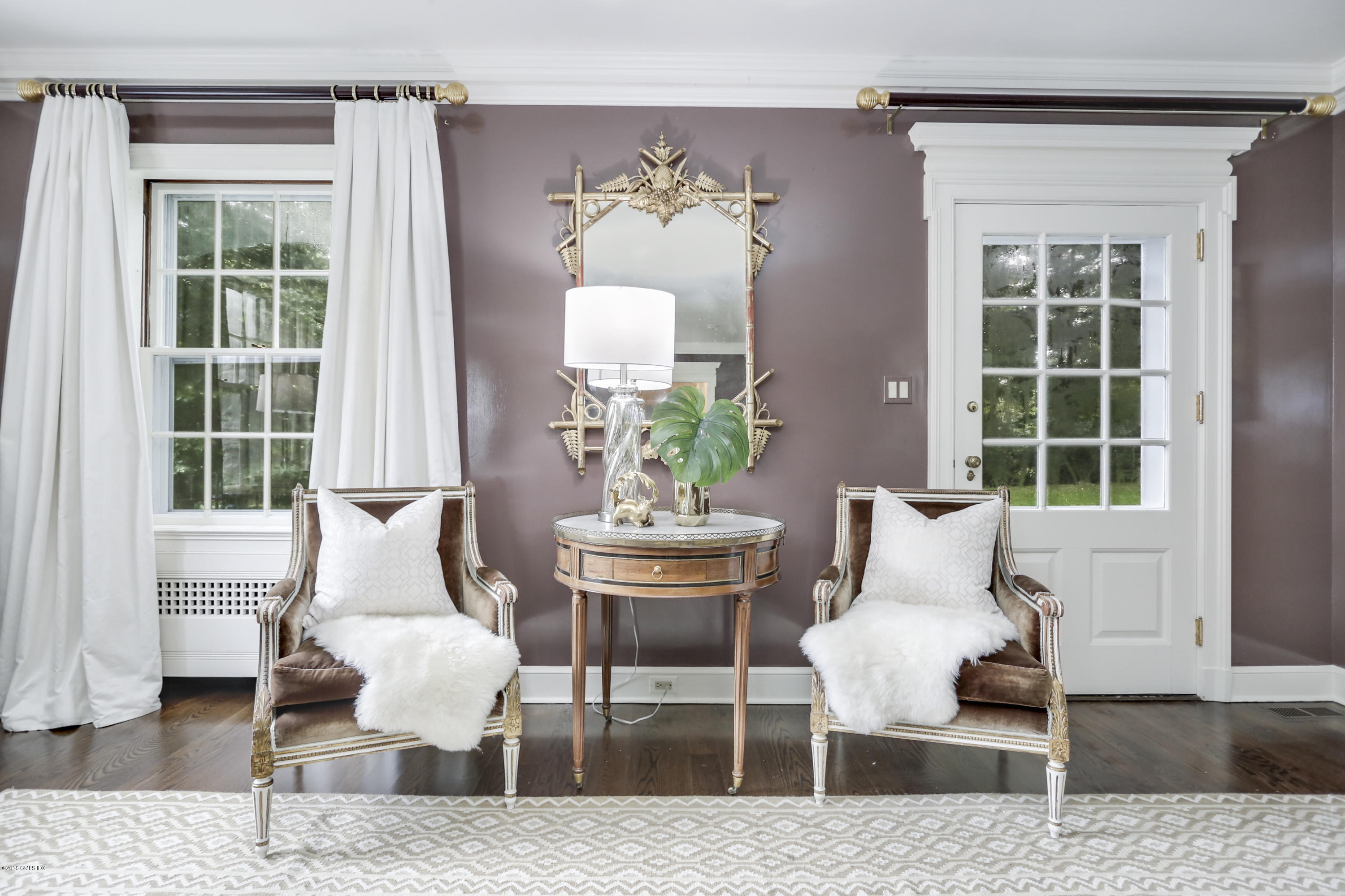 70 Midwood Road Greenwich, CT 06830 - Photo 6 of 26 a living room with furniture and a large window