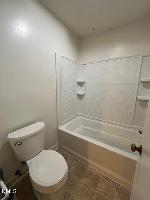 2516 Avent Ferry Road, Unit 102 Raleigh, NC 27606 - Photo 13 of 15 a white toilet sitting next to a bath tub