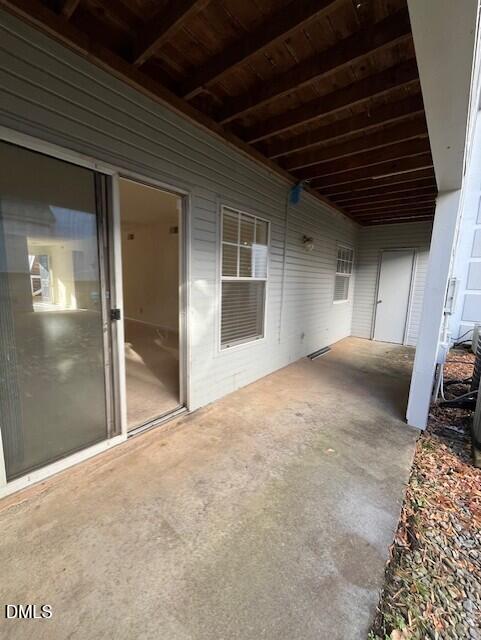 2516 Avent Ferry Road, Unit 102 Raleigh, NC 27606 - Photo 15 of 15 a view of a livingroom with wooden floor and a window