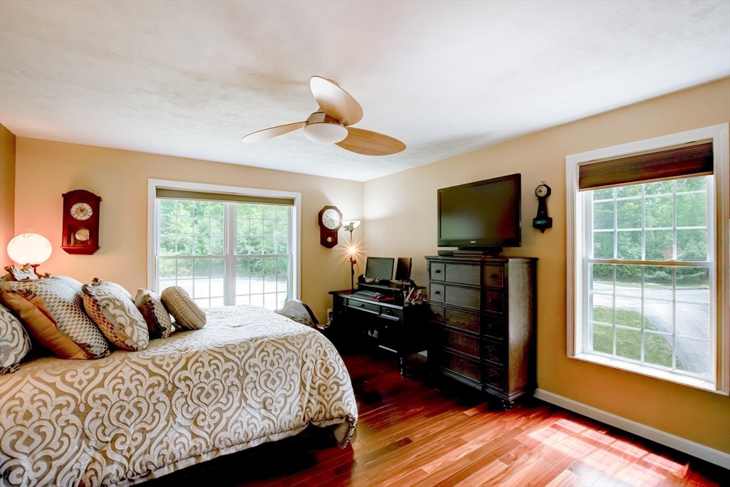 6 Loon Road Winchendon, MA 01475 - Photo 16 of 36 a bedroom with a bed and a flat tv screen on dresser