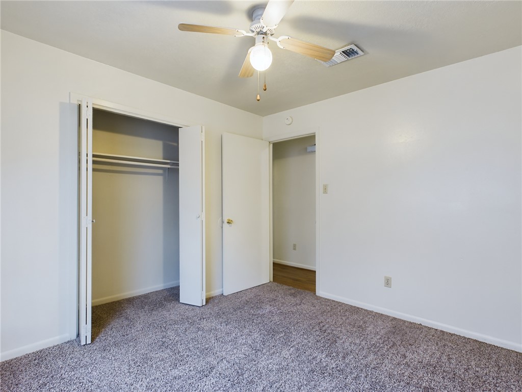 1221 April Bloom, Unit AB College Station, TX 77840 - Photo 18 of 31 a view of a room with a ceiling fan