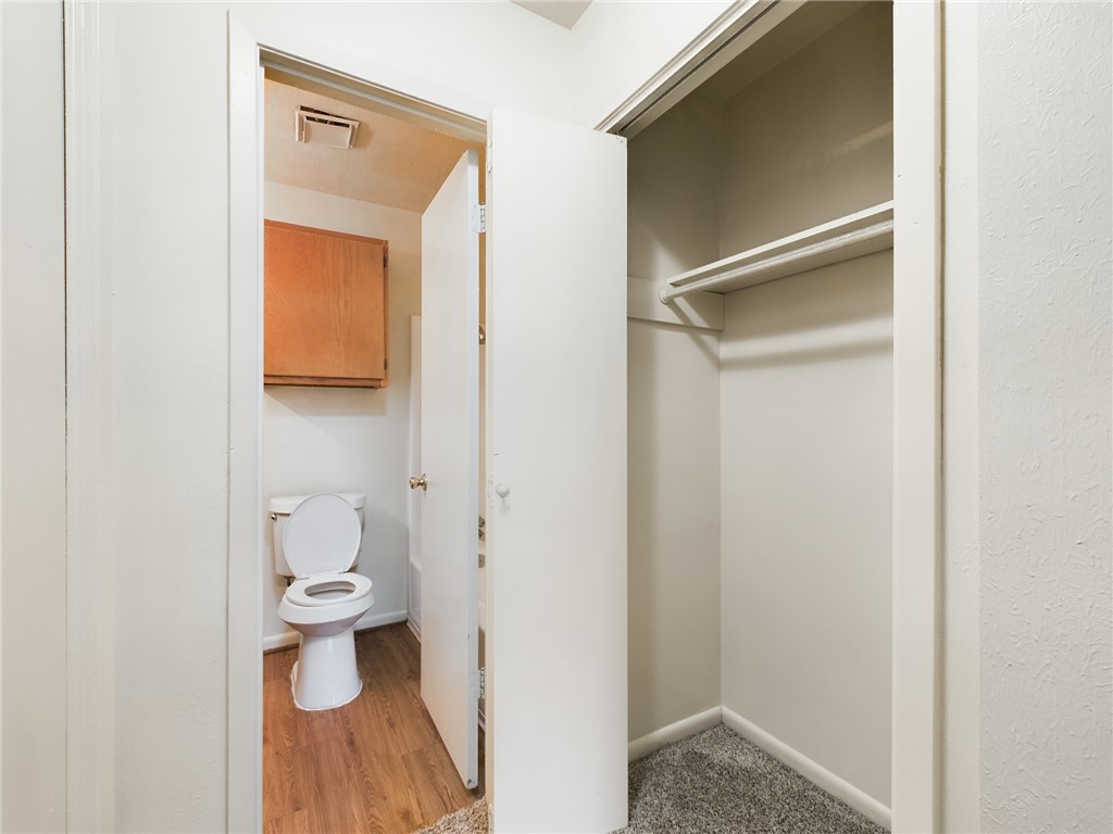 1221 April Bloom, Unit AB College Station, TX 77840 - Photo 27 of 31 a bathroom with a toilet