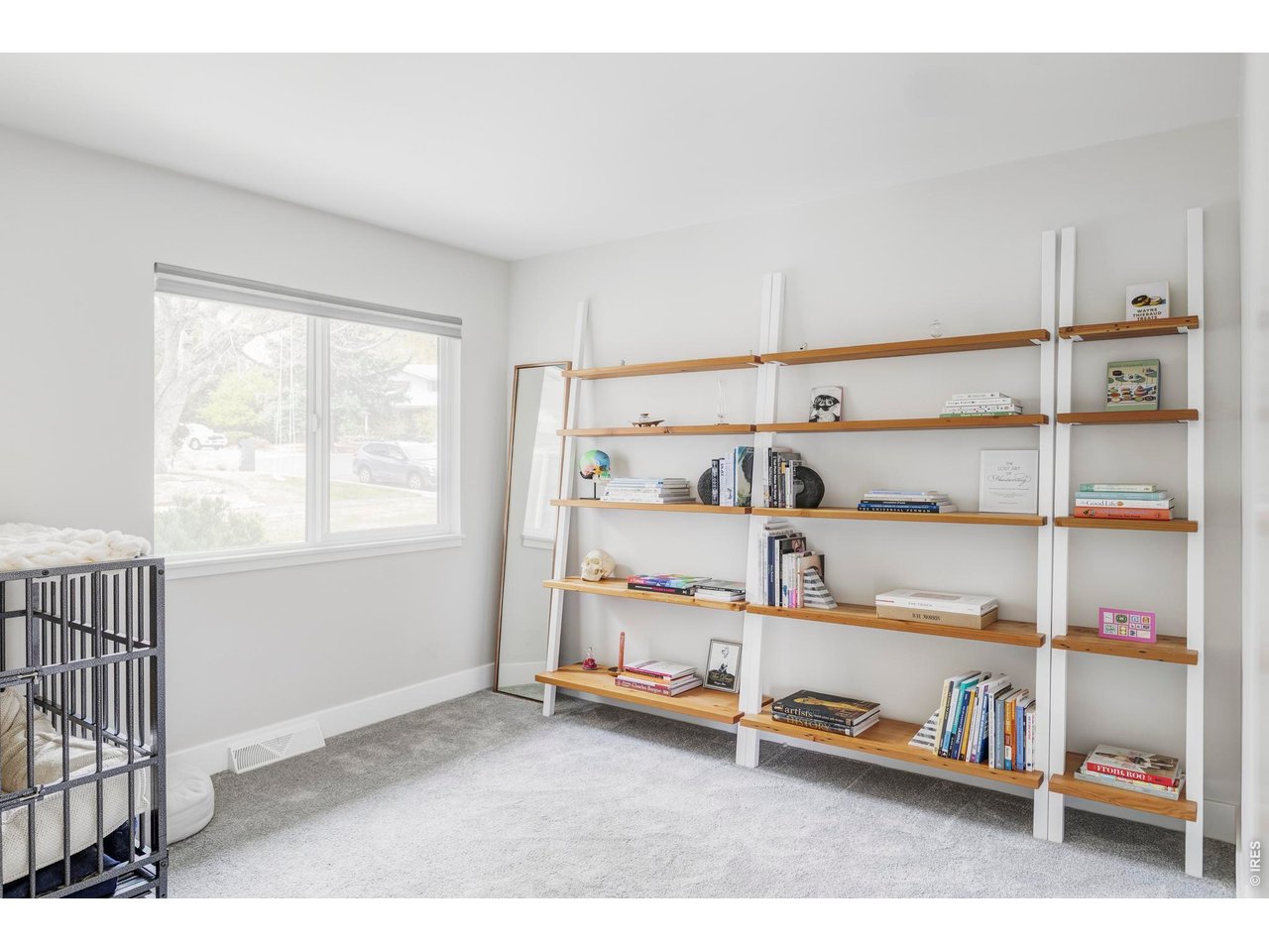 646 Furman Way Boulder, CO 80305 - Photo 16 of 38 An additional bedroom and a dedicated office on this level provide flexibility for guests, work, or evolving needs, all while keeping essential living spaces on one level.