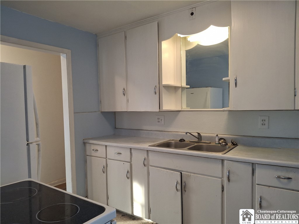 269 Delaware Avenue Jamestown, NY 14701 - Photo 2 of 8 Galley Style Kitchen