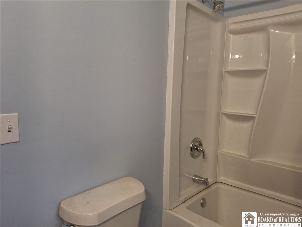 269 Delaware Avenue Jamestown, NY 14701 - Photo 6 of 8 Full bath with tub and shower surround