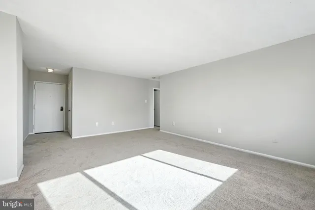 an empty room with an entryway