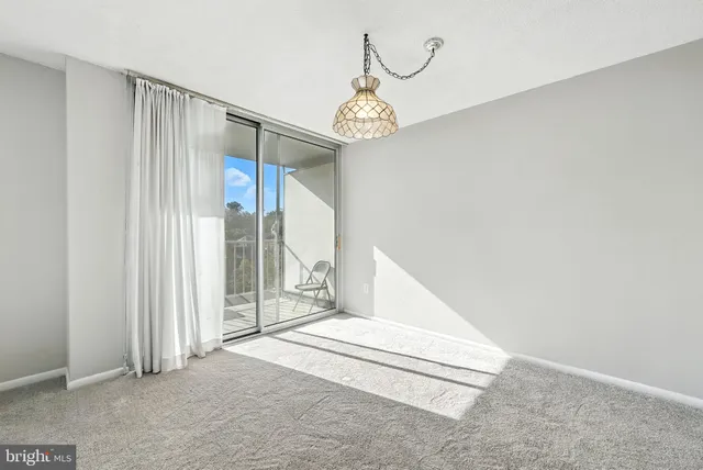 a view of a hallway with entryway