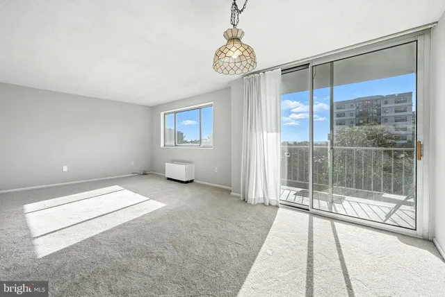 a view of an empty room and window