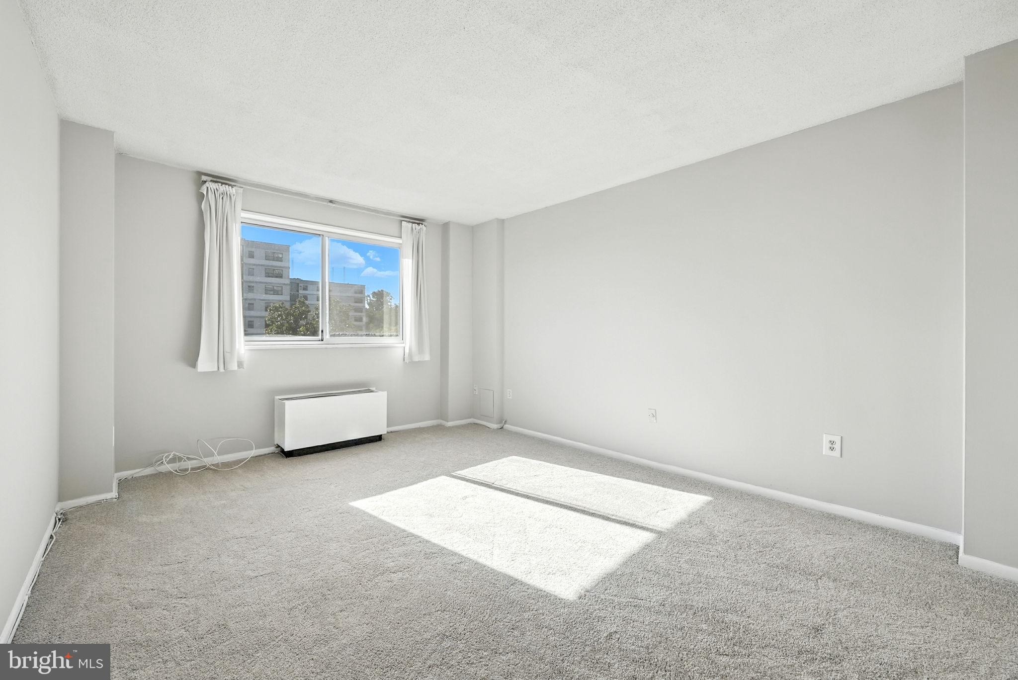 2059 Huntington Avenue, Unit 503 Alexandria, VA 22303 - Photo 17 of 22 a view of an empty room with a window