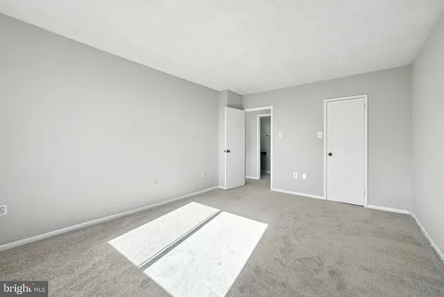 an empty room with an entryway