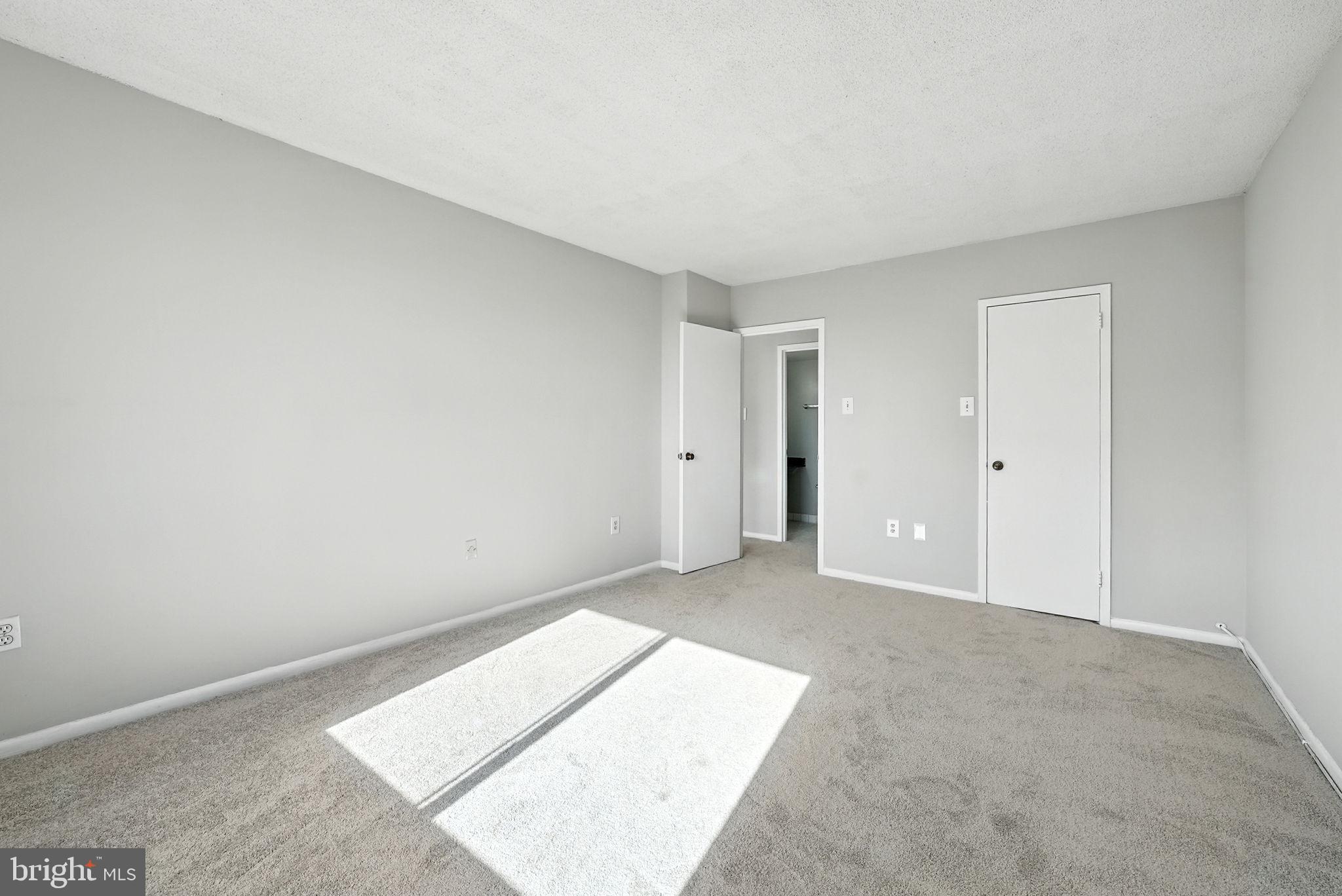 2059 Huntington Avenue, Unit 503 Alexandria, VA 22303 - Photo 18 of 22 an empty room with an entryway