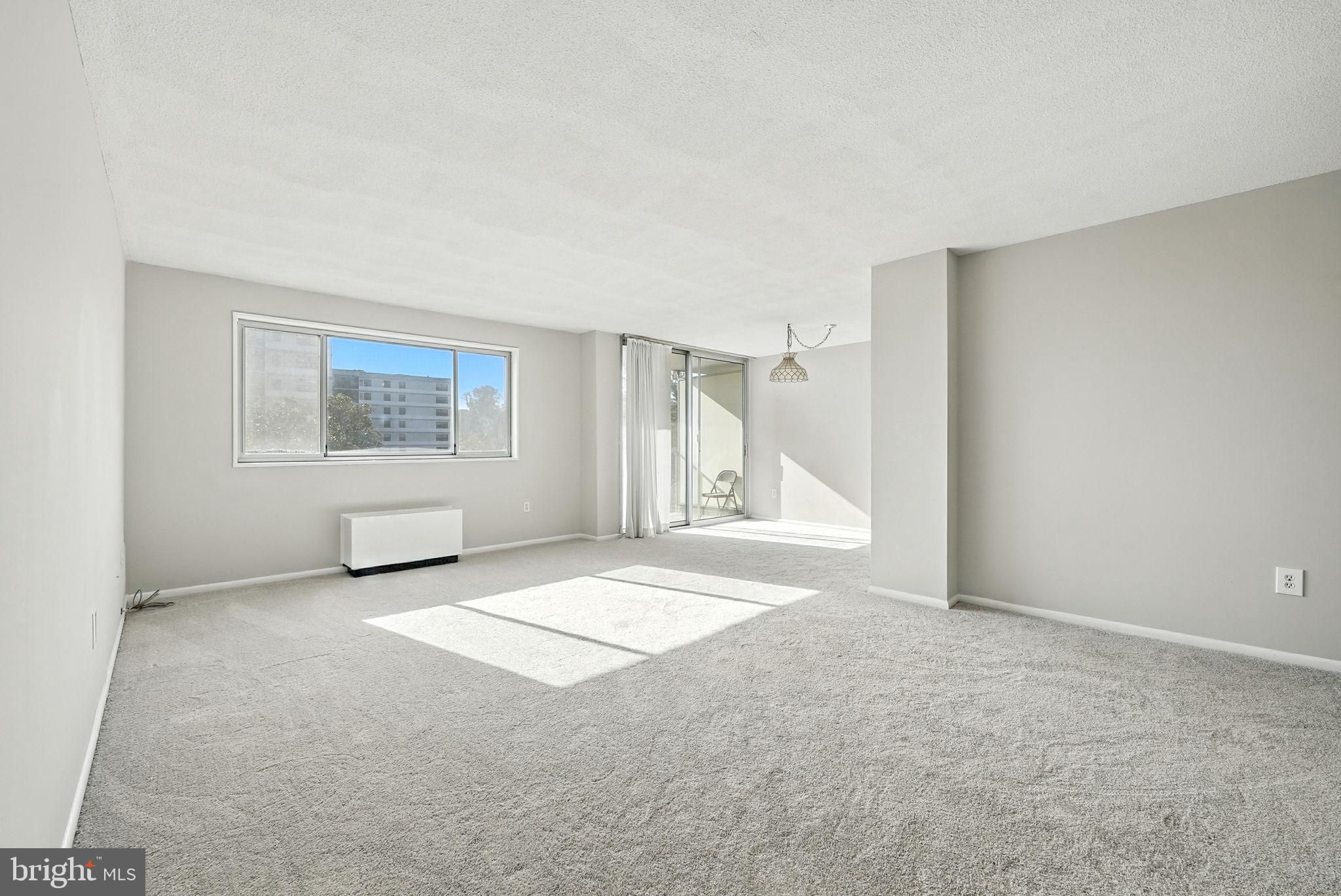 2059 Huntington Avenue, Unit 503 Alexandria, VA 22303 - Photo 3 of 22 a view of an empty room with a window