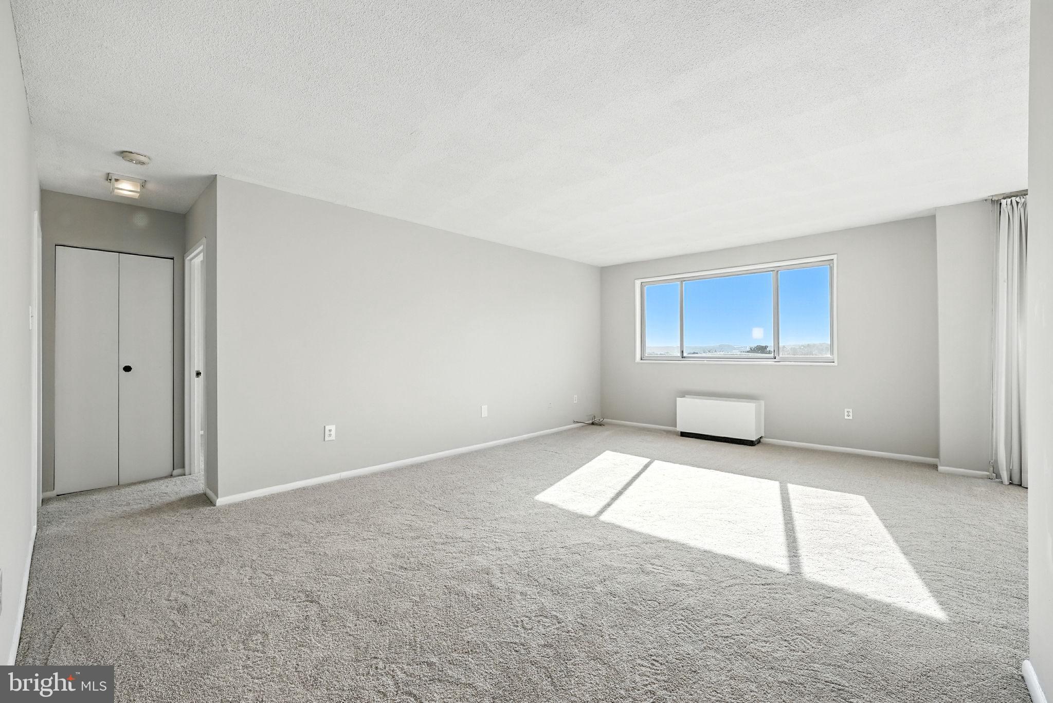 2059 Huntington Avenue, Unit 503 Alexandria, VA 22303 - Photo 4 of 22 a view of an empty room and window