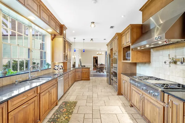 a bedroom with a bed and a dresser in it