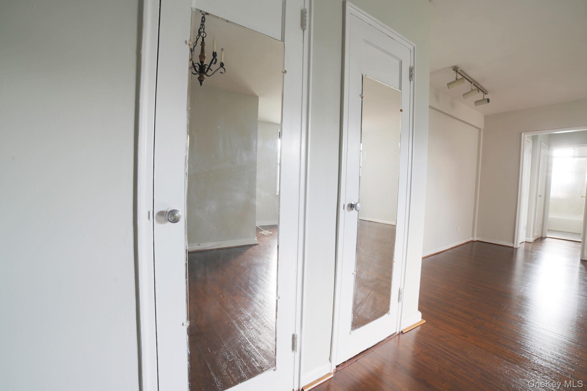 5621 Netherland Avenue, Unit 5C Bronx, NY 10471 - Photo 7 of 10 a view of a bathroom with a glass shower door