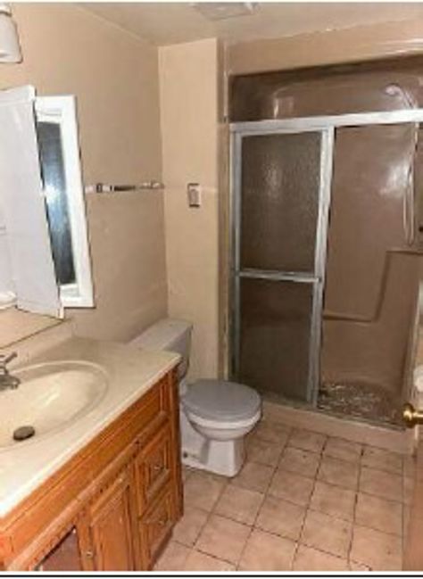 3710 Briar Lane Hazel Crest, IL 60429 - Photo 22 of 27 a bathroom with a sink toilet and shower